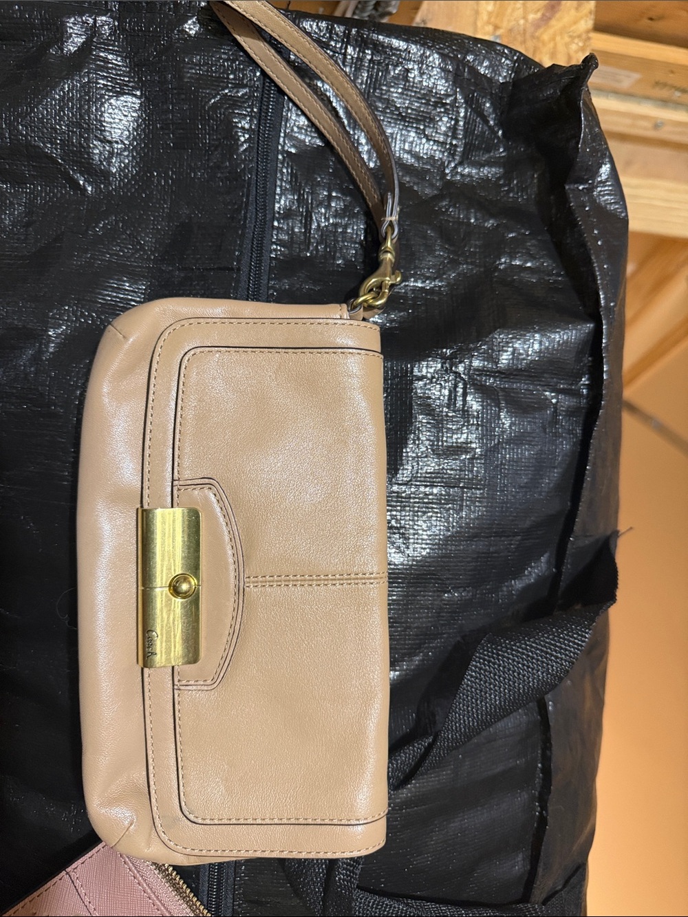 Coach Soft Beige Leather Wristlet Clutch with Gold-Tone Lock